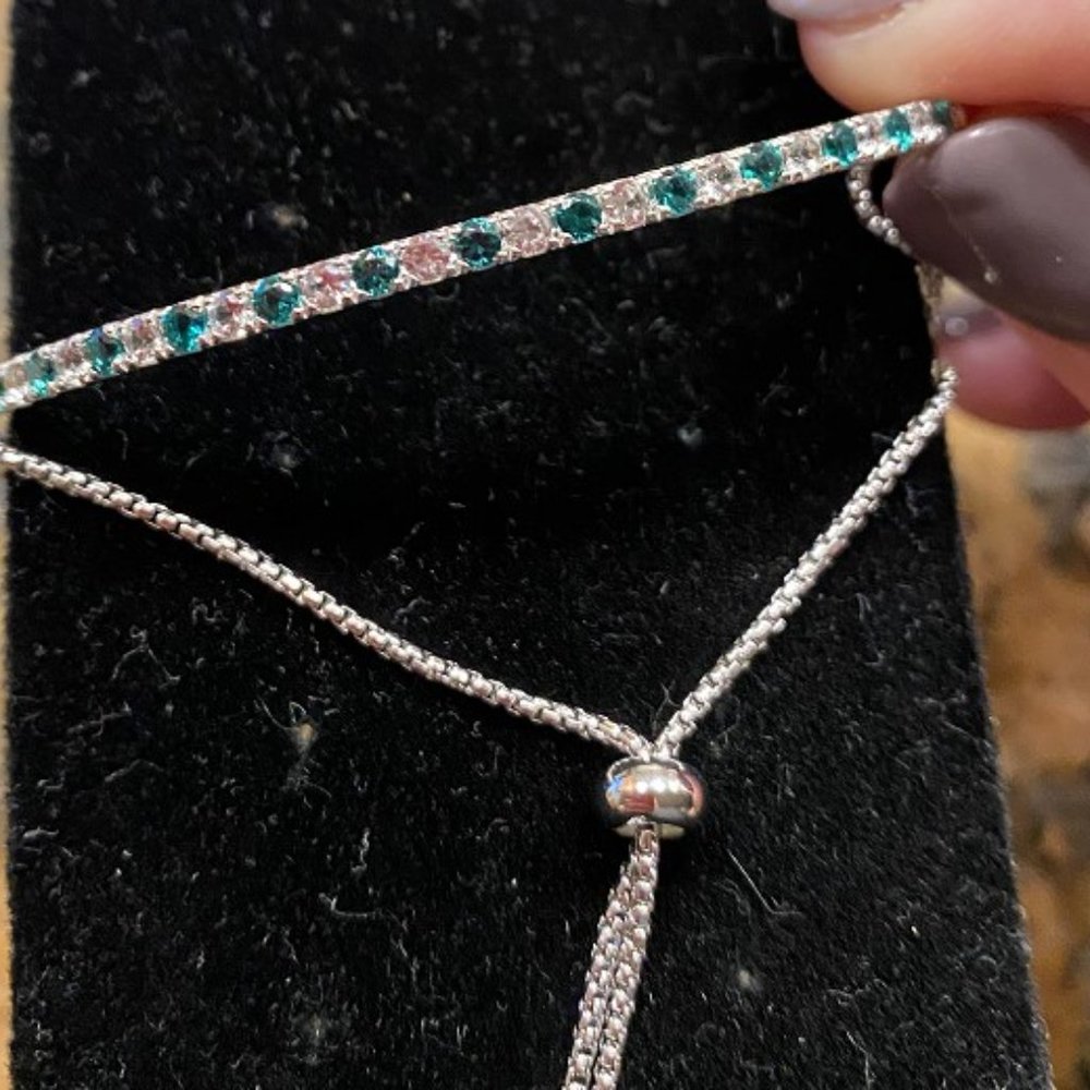Sterling silver with fashion emeralds